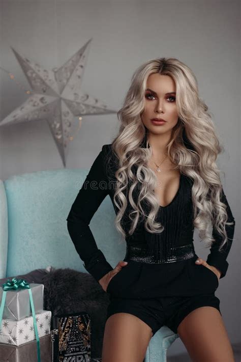 Gorgeous Brunette In Mini Black Dress And Silver Heels In Christmas Room Stock Image Image Of