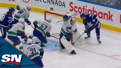 Maple Leafs Nylander Tucks It In Behind Canucks Demko To Extend Point