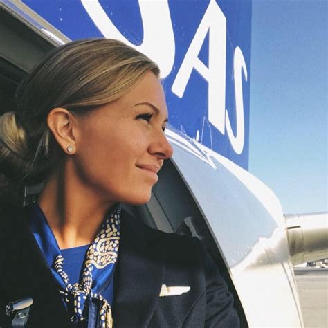 Flight Attendant With Big Fake Tits Takes Cock In The Cockpit