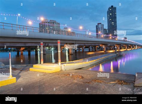 Bridge Over Nerang River With Southport Building In Background Just