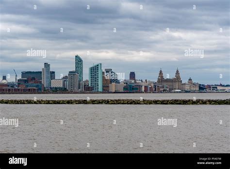 The City Of Liverpool Skyline In England Viewed From The River Mersey