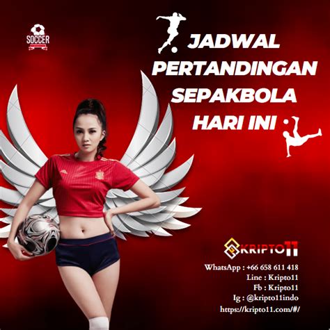 A Woman In Red Shirt And Black Shorts Holding A Soccer Ball With Wings