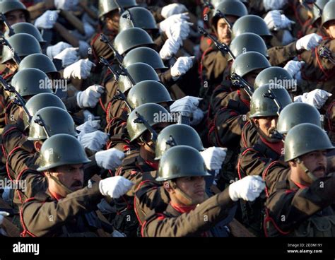 Iraqi Troops Parade Before President Saddam Hussein In Baghdad December