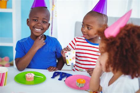 Excited Kids Enjoying a Birthday Party Stock Photo - Image of ...