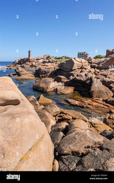 The Pors Kamor lighthouse along the Côte de granit rose Pink Granite