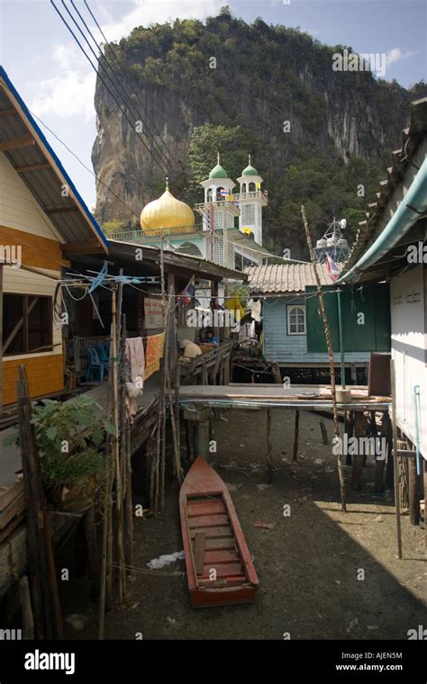 A gold dome tops the mosque Ko Panyi Muslim fishing village on stilts ...