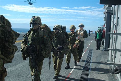 Fileus Navy 120210 N Xh369 006 Members From The Japan Ground Self Defense Force File Along The