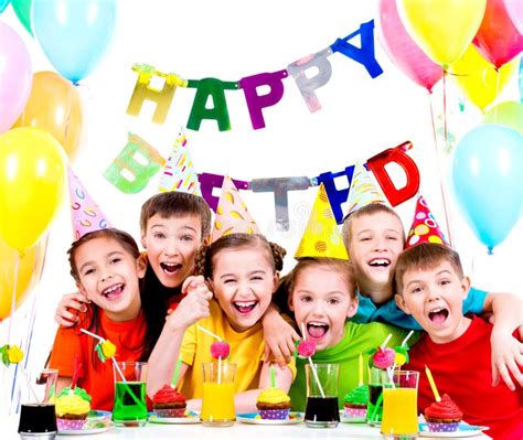 Group Of Laughing Kids Having Fun At The Birthday Party. Stock Photo ...