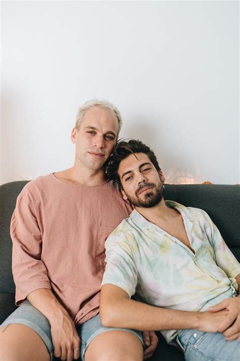 Gay Happy Couple Sitting On Sofa Stock Photo Image Of Couple Home 238265574