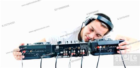 young dj man with headphones and compact disc dj equipment, Stock Photo ...