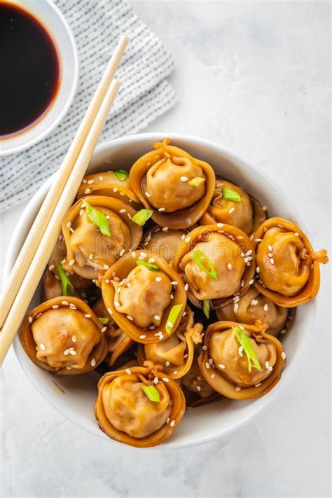 Fried Dumplings With Soy Sauce With Pepper And Green Onions Asian