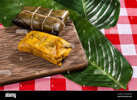 Tamale Typical Colombian Food Wrapped In Banana Leaves Stock Photo Alamy