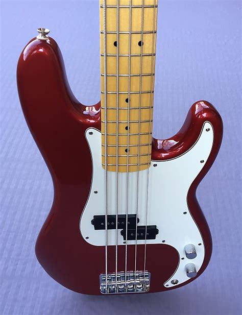 Squier Vintage Modified Precision Bass V 5 String In Candy Reverb