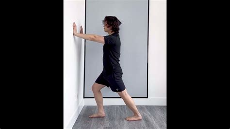 Standing Calf Stretch Soleus And Gastrocnemius Assisted Stretch Youtube