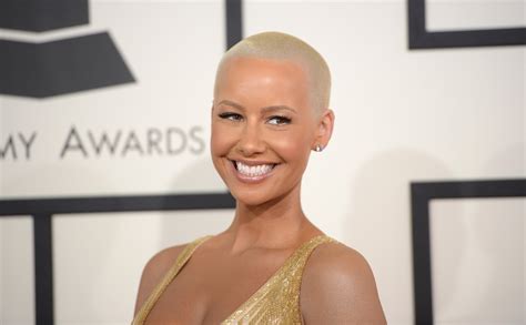 Amber Rose Suffers Wardrobe Malfunction In Cleavage Baring Jumpsuit At Book Promotion Ibtimes