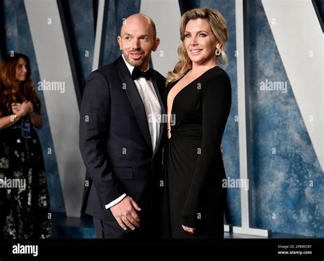 Paul Scheer Left And June Diane Raphael Arrive At The Vanity Fair