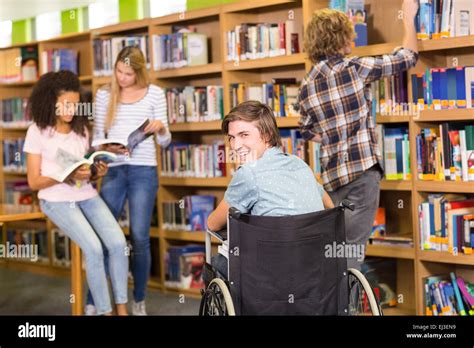 College students in library Stock Photo - Alamy