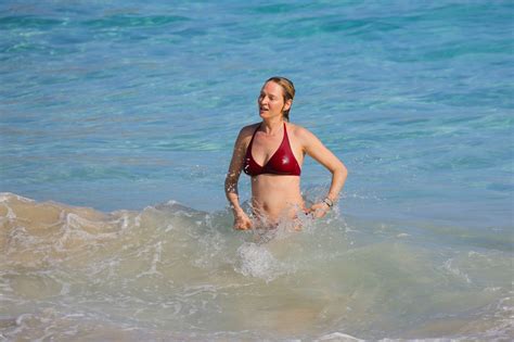 Uma Thurman Busty Showing Pokies In A Skimpy Red Bikini At The Beach In StBarts Porn Pictures