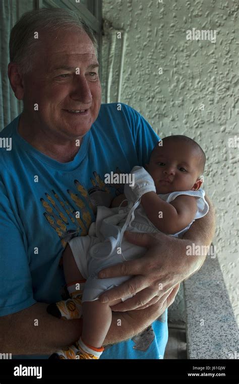 Father Holds His Baby Stock Photo Alamy