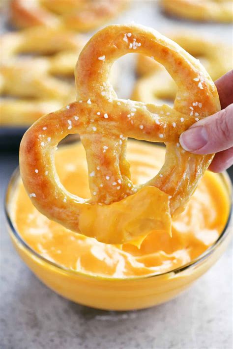 Soft Pretzel Dipped In Cheese Sauce Pretzel Recipe Easy Soft Pretzel Recipe Soft Pretzels