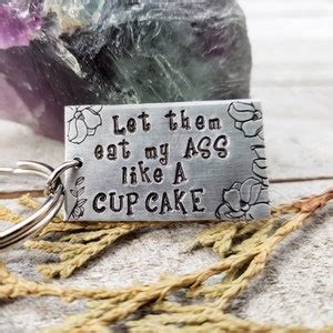 Funny Stamped Keychain Let Them Eat My Ass Like A Cupcake Funny
