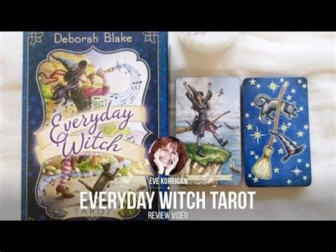 Two Tarot Cards Sitting Next To Each Other