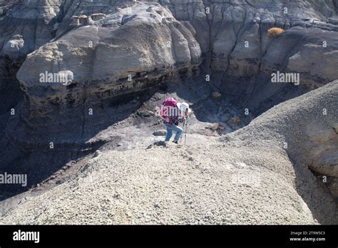 A Solo Female Hikes The Wide Open Badlands Of The San Juan Basin In New