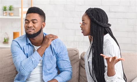 Black Couple Quarreling At Home Wife Blaming Husband Stock Image