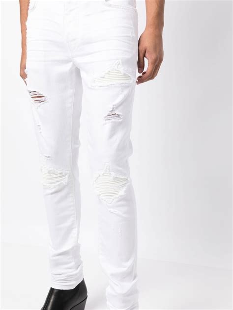 Amiri Ripped Detail Slim Cut Jeans Farfetch