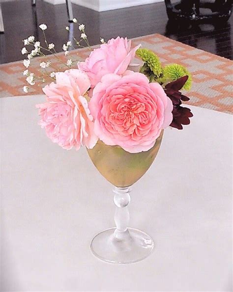 Pink roses centerpiece | Rose centerpieces, Pink roses, Centerpieces