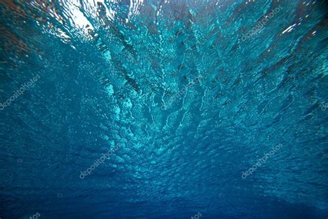 Photo of underwater ripple waves — Stock Photo © cppzone.mail.ru #106362362