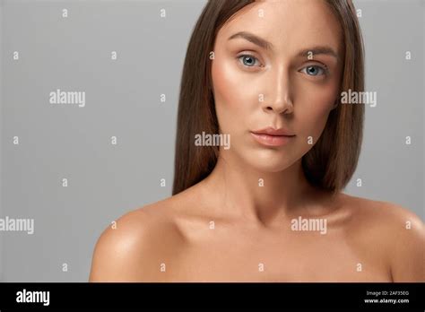 Crop Of Young Beautiful Brunette Woman With Fresh Clean Skin Portrait Of Serious Pretty Girl