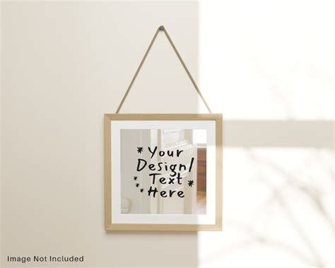 Premium Psd Reflection Mirror With Wooden Frame Hanging On Wall Mockup