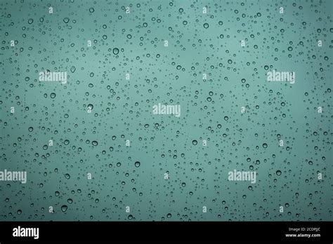 Rain droplets on a window Stock Photo - Alamy