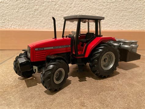 SIKU Massey Ferguson 4270 Mit Milchkannen Kaufen Auf Ricardo