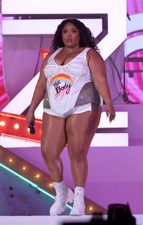 Lizzo Shines at Art Basel in White Leotard & Prada Combat Boots ...