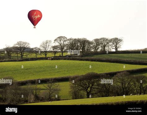 Virgin Hot Air Balloon Floats Over Devon Countryside Near Holsworthy