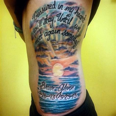 Very Romantic Looking Colorful Ocean Sunrise With Lettering Tattoo On Side Tattooimages