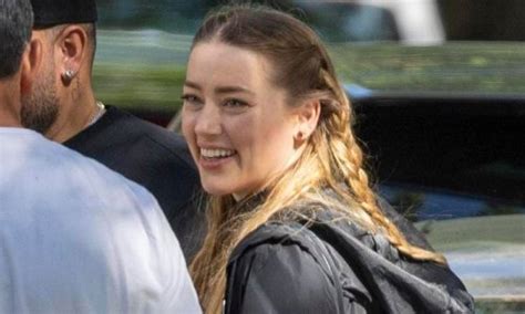 Amber Heard Is All Smiles In Madrid Amid Johnny Depp Teeth Controversy