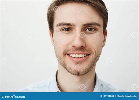 Close Up Portrait Of Attractive Confident Adult Male With Bristle