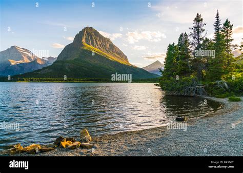 Beautiful Landscape At Swiftcurrent Lake When Sunrise In Many Glacier