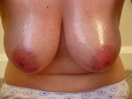 Super Tits The Tit Buster Dangling Oiled Tits DIAL UP
