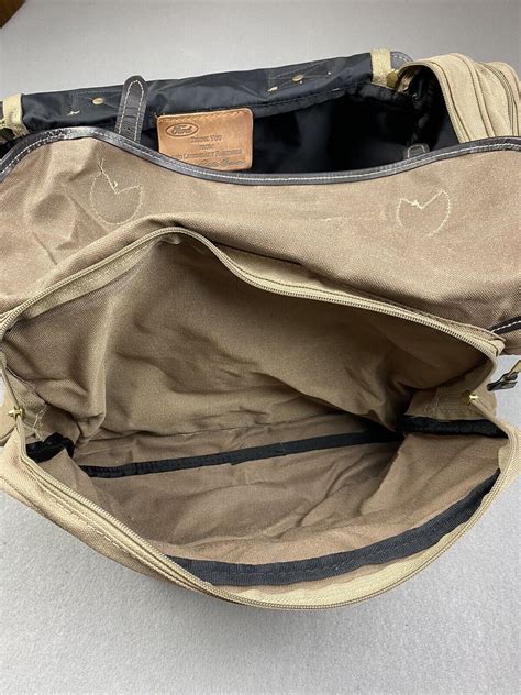 Vintage Eddie Bauer Ford Duffle Bag Tan Canvas Leathe Gem