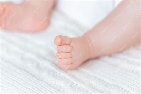 Premium Photo New Born Baby Feet