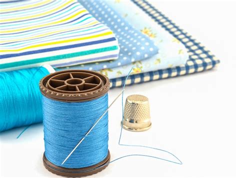 Free Photo Blue Embroidery Set Over White Background