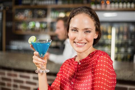 Premium Photo Smiling Woman Holding Cocktail