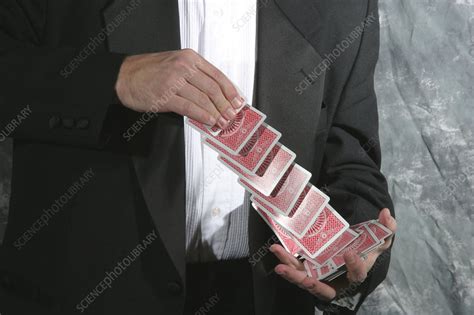 Shuffling Cards - Stock Image - H100/0890 - Science Photo Library