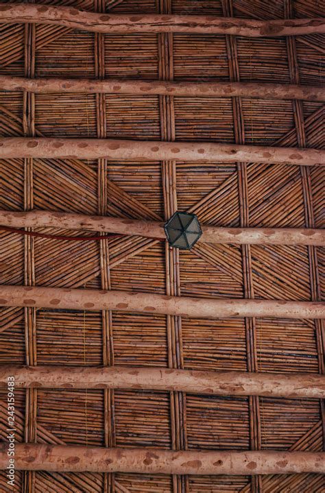 Maroccan wooden twig ceiling. Bamboo ceiling in african house ...