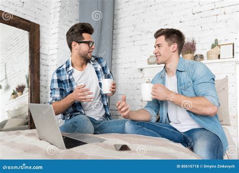Handsome Gay Men Spending Time Together Stock Photo Image Of Drink Home
