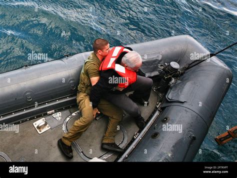 Israeli Prime Minister Benjamin Netanyahu Right Is Assisted By A Soldier After Losing His